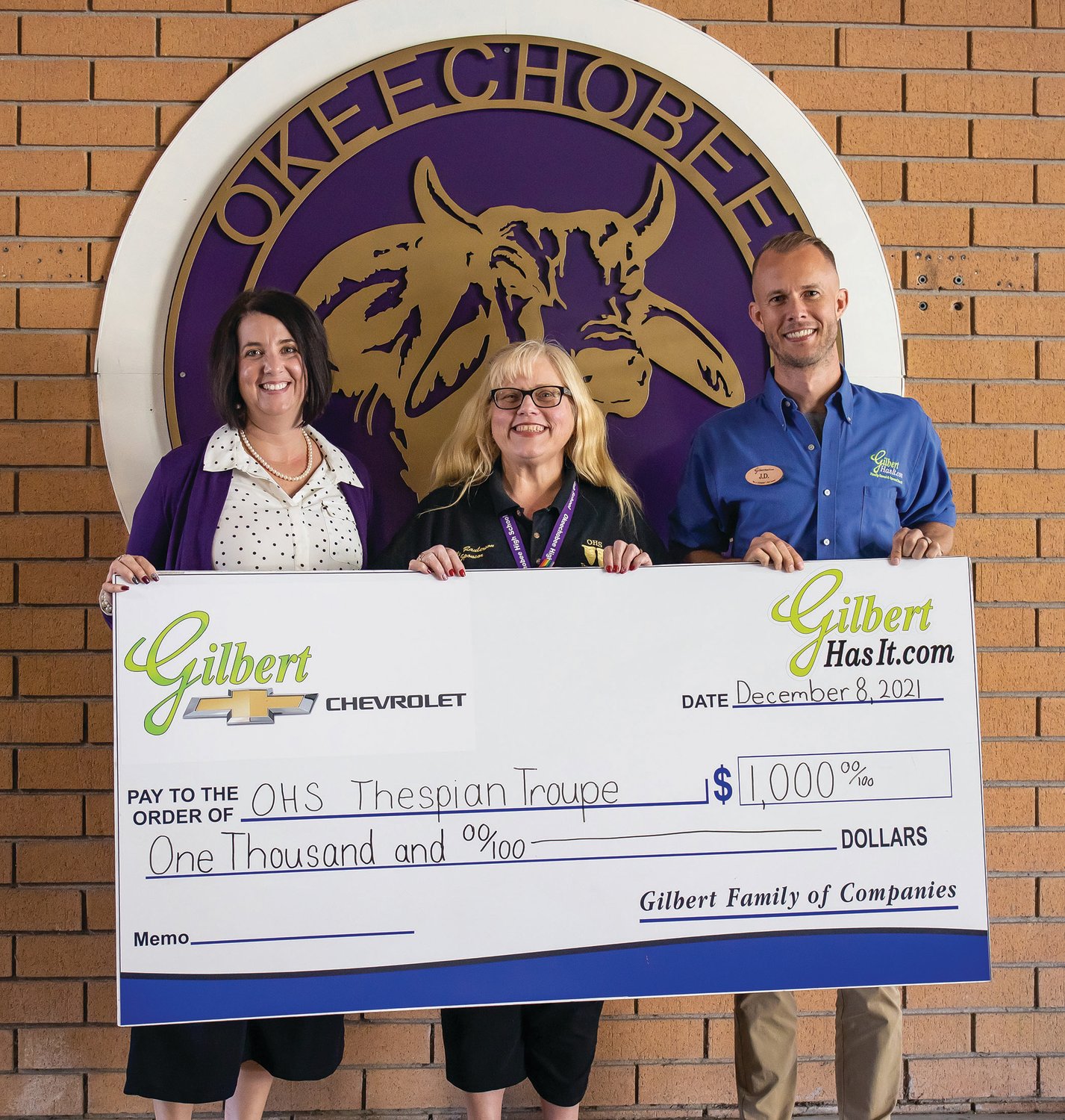 Gilbert Chevrolet representative J.D. Mixon (right) presented a $1,000 check to OHS Principle Lauren Myers (left) and Thespian Troupe teacher Debbie Raulerson (middle).